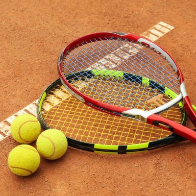 tennis-racquets-with-tennis-balls-on-clay-court.jpg tennis-racquets-with-tennis-balls-on-clay-court.jpg